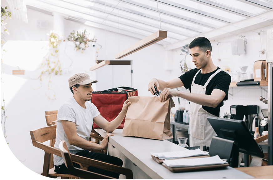 Business Packing up food for delivery driver